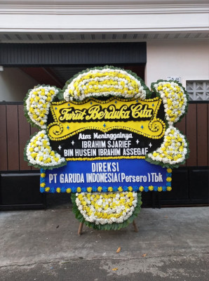 Papan Bunga Duka di Soko